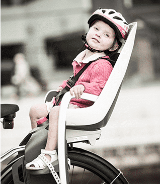 Little girl in frame mount Caress kids bike seat